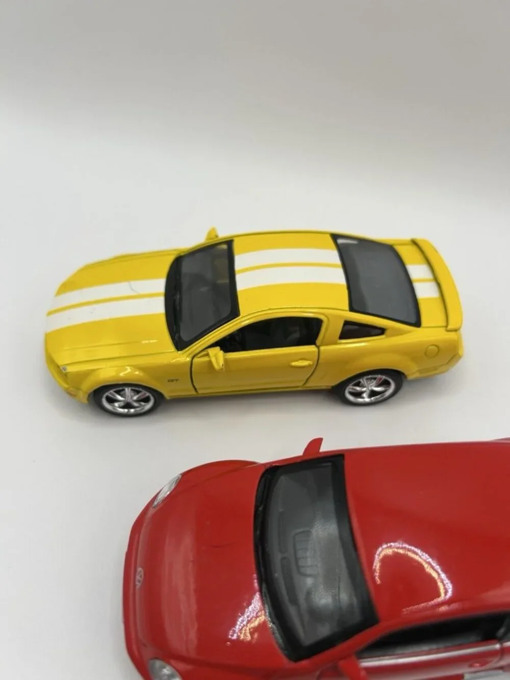 Lot of 3 Diecast Cars Corvette VW Beetle Mustang Kinsmart Scale Blue Red Yellow